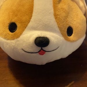 Plush with heatable pouch